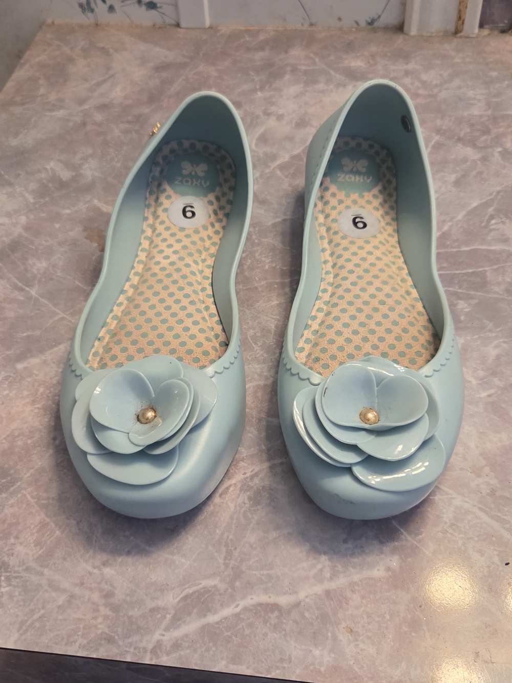 Women’s Light Blue Floral Jelly Flats by Zaxy